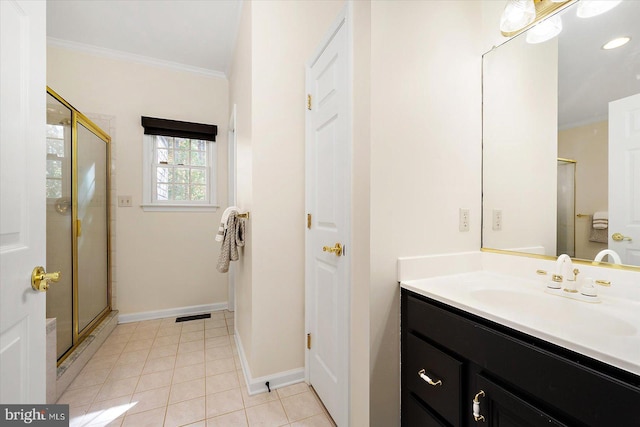 bathroom with tile patterned flooring, vanity, an enclosed shower, and ornamental molding