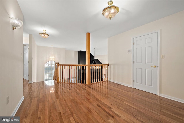 hall featuring wood-type flooring