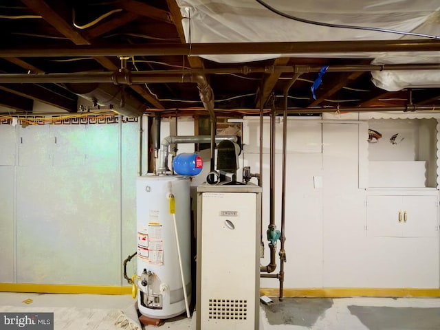 utility room with gas water heater