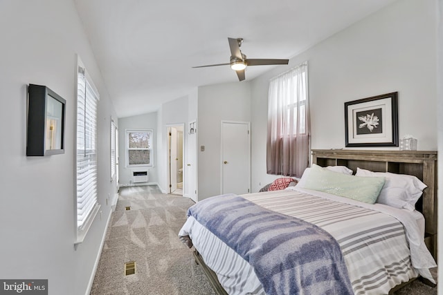 bedroom featuring light carpet, ceiling fan, and lofted ceiling