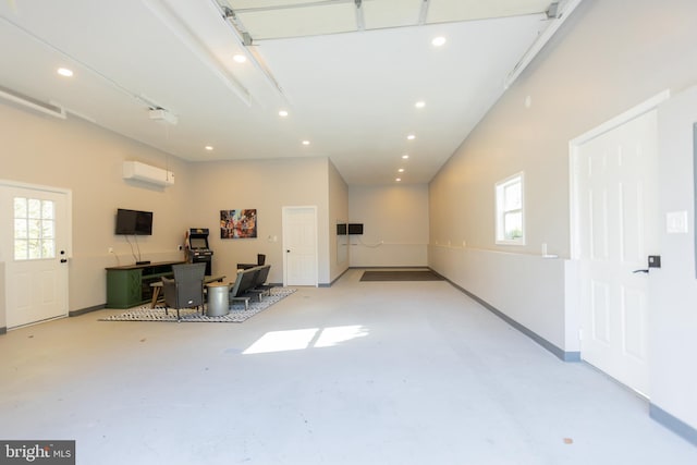 garage with a wall mounted air conditioner