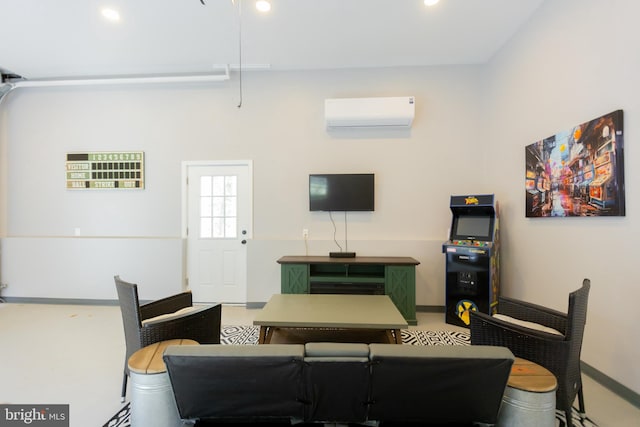 living room featuring a wall unit AC