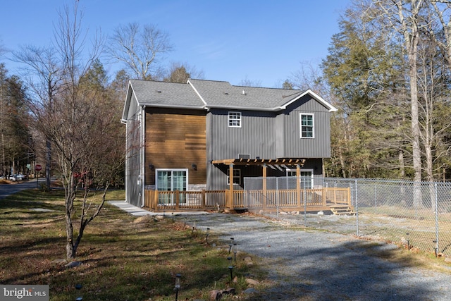 view of front of property with a deck