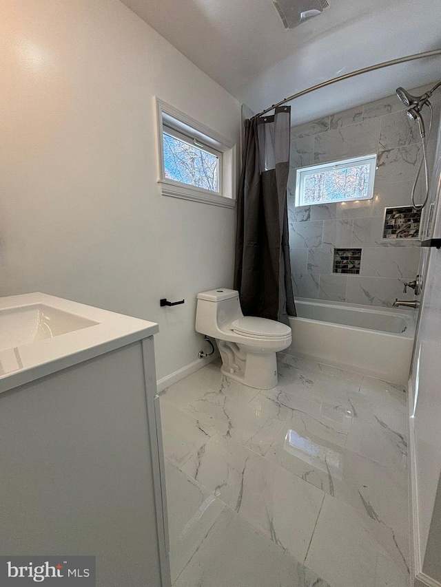 bathroom with healthy amount of natural light, toilet, shower / tub combo, and vanity