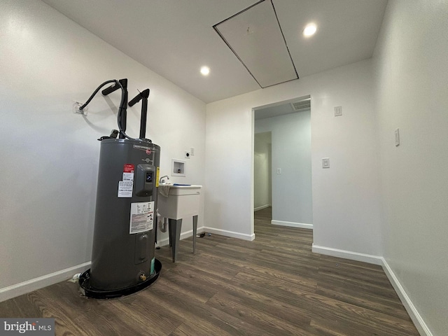 utility room featuring electric water heater