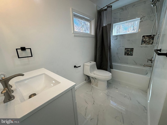 full bathroom featuring vanity, shower / tub combo, toilet, and plenty of natural light