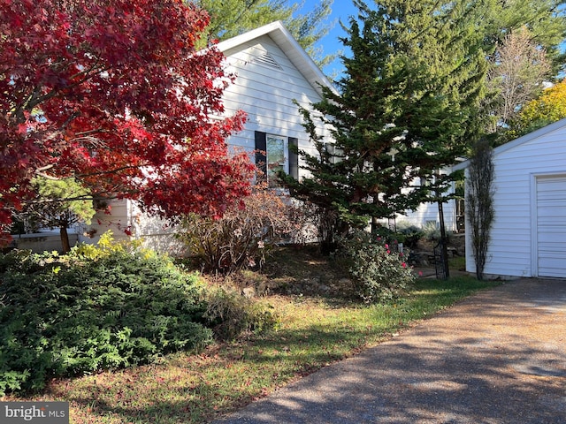 view of home's exterior with a garage