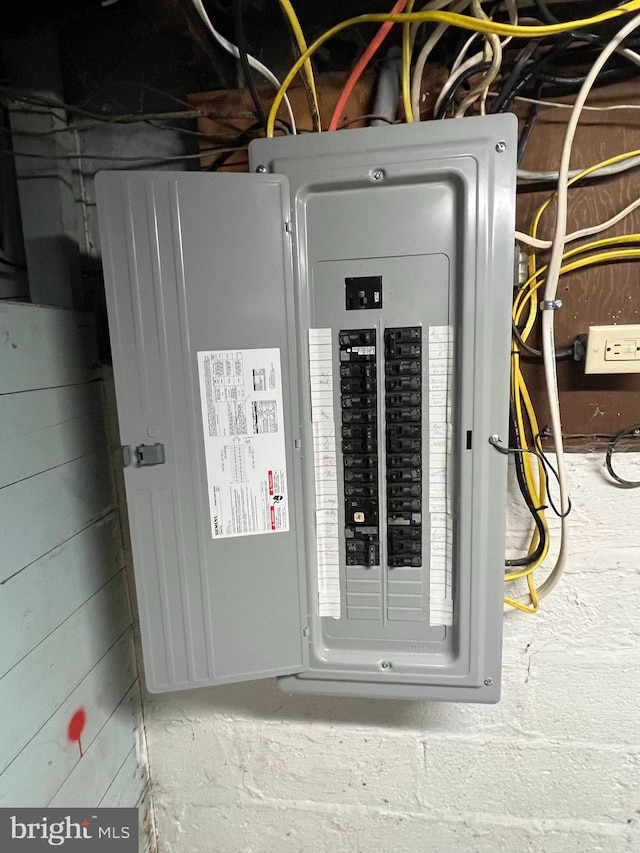 utility room featuring electric panel