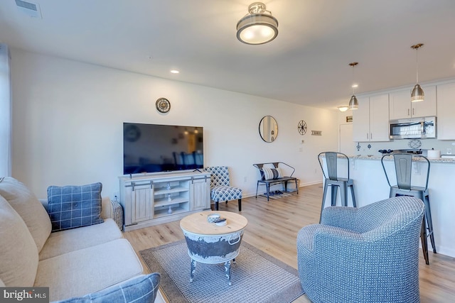 living room featuring light hardwood / wood-style floors