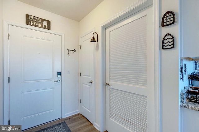 doorway featuring hardwood / wood-style flooring