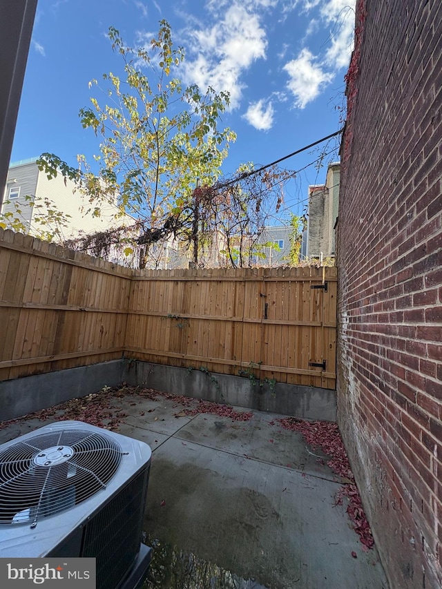 view of patio with cooling unit