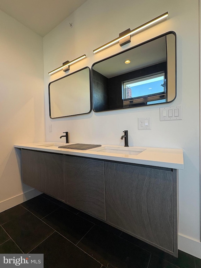 bathroom featuring tile patterned floors and vanity