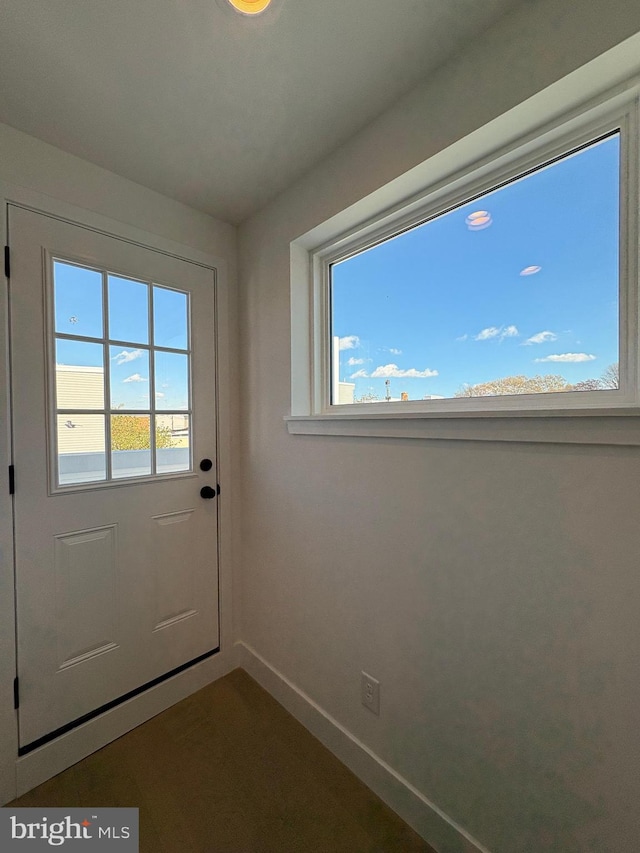 doorway to outside with a healthy amount of sunlight