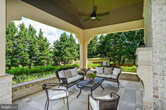 view of patio with an outdoor hangout area and ceiling fan