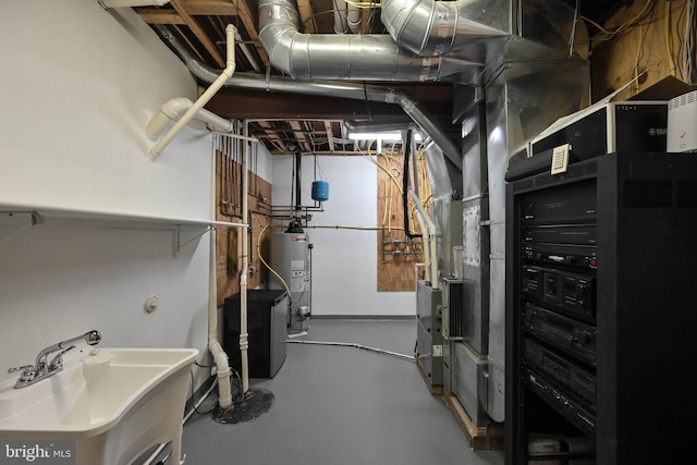 utilities with sink and water heater