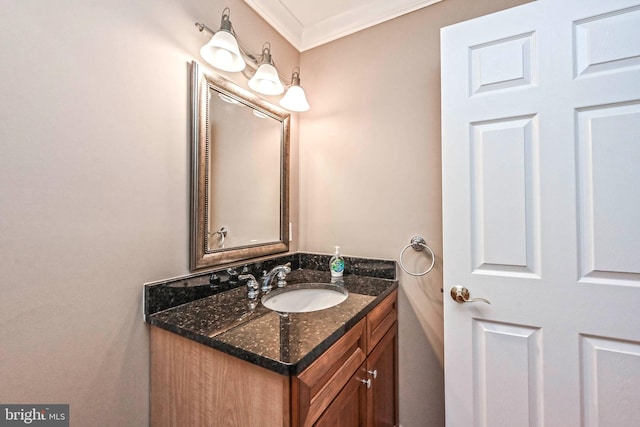 bathroom featuring vanity and crown molding