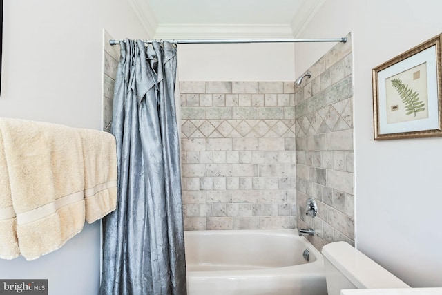 bathroom featuring shower / bath combination with curtain, toilet, and crown molding