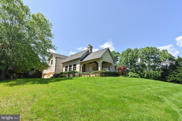 exterior space with a lawn