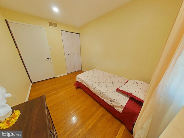 bedroom featuring hardwood / wood-style floors