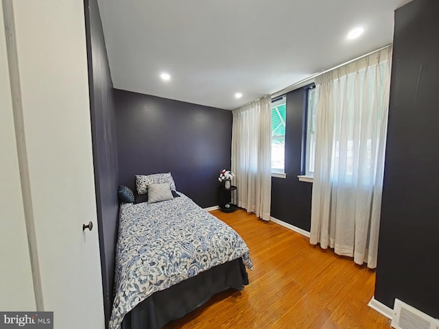 bedroom featuring light wood-type flooring