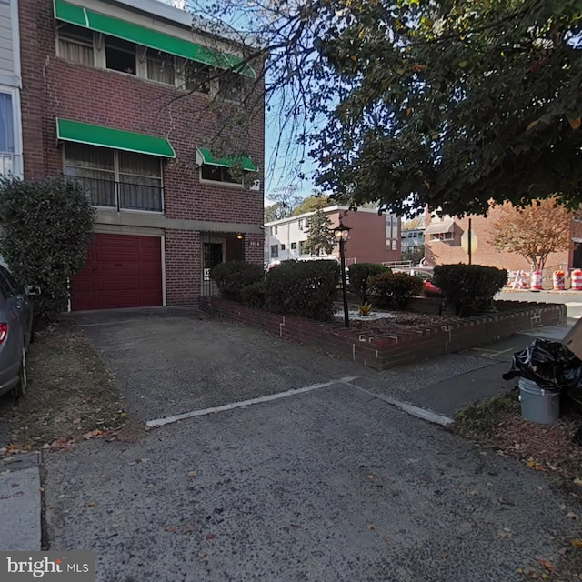 exterior space with a garage