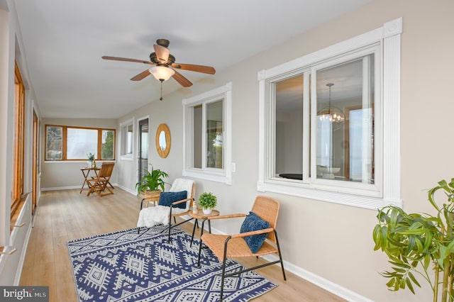 2142 Lake Dr, Pasadena, MD 21122 - sunroom featuring a chandelier