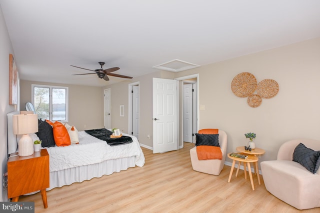 2142 Lake Dr, Pasadena, MD 21122 - bedroom featuring wood finished floors, attic access, baseboards, and a ceiling fan