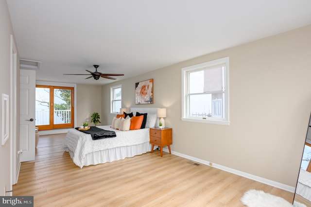 2142 Lake Dr, Pasadena, MD 21122 - bedroom with light wood-style floors, baseboards, and a ceiling fan