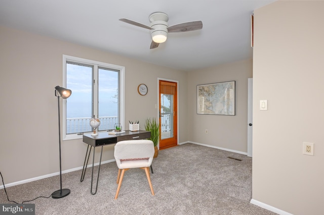 2142 Lake Dr, Pasadena, MD 21122 - home office featuring carpet floors, ceiling fan, and baseboards