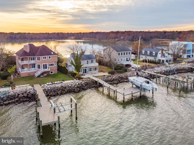 2142 Lake Dr, Pasadena, MD 21122 - dock area with boat lift, a water view, a yard, and stairs