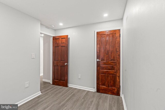 unfurnished bedroom featuring hardwood / wood-style floors