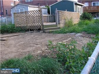 view of yard with a wooden deck