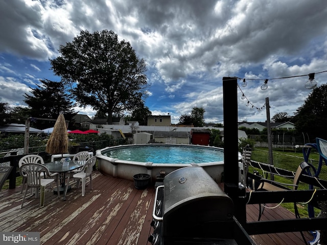 255 Regina Ave, Hamilton, NJ 08619 - view of pool with a wooden deck, a fenced backyard, outdoor dining area, and a grill