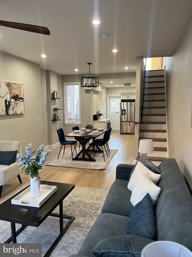 living room with light hardwood / wood-style floors