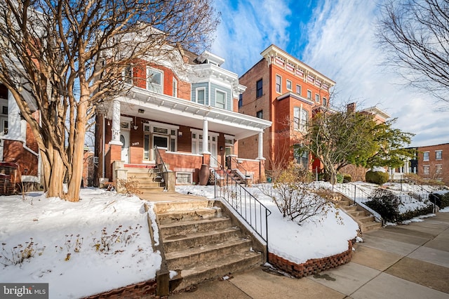 view of front of home featuring covered porch