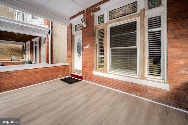 doorway to property featuring a porch