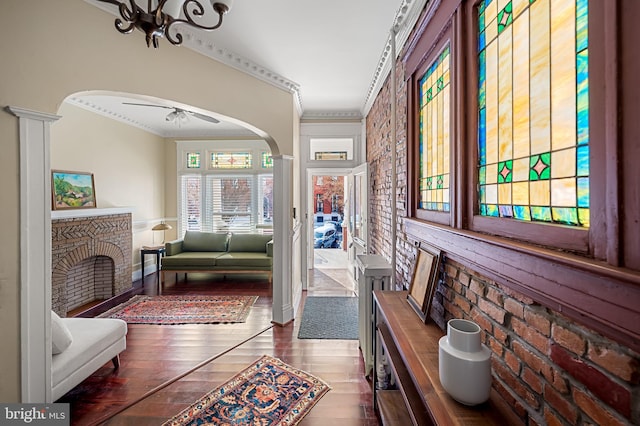 hall featuring dark hardwood / wood-style floors and ornamental molding