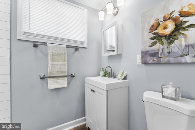 bathroom with toilet and sink