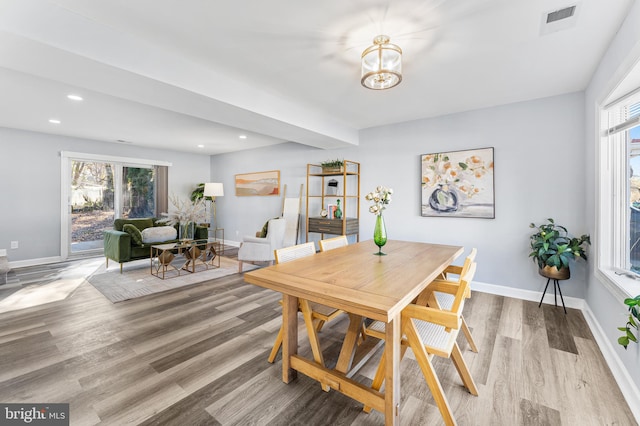 dining space featuring light hardwood / wood-style flooring