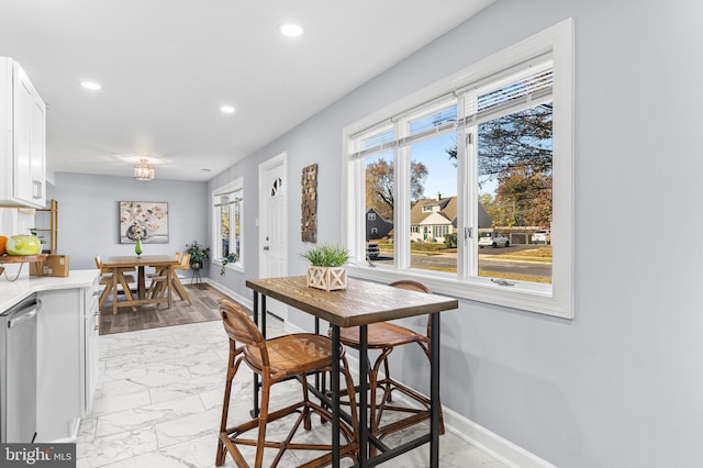 dining area with light wood-type flooring