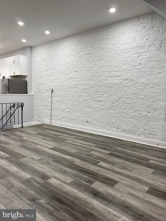 interior space with dark hardwood / wood-style flooring