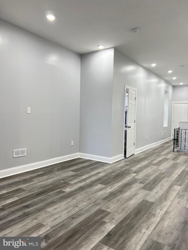 interior space with dark hardwood / wood-style floors