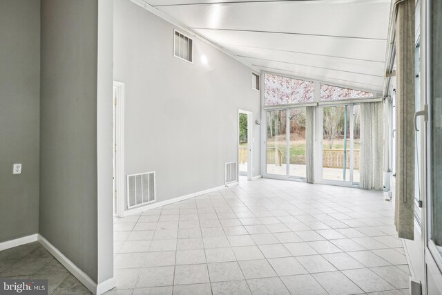 unfurnished sunroom featuring lofted ceiling