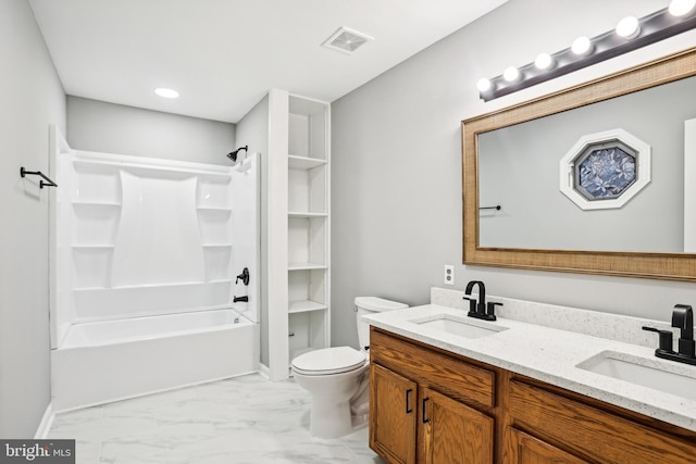 full bathroom featuring washtub / shower combination, vanity, and toilet