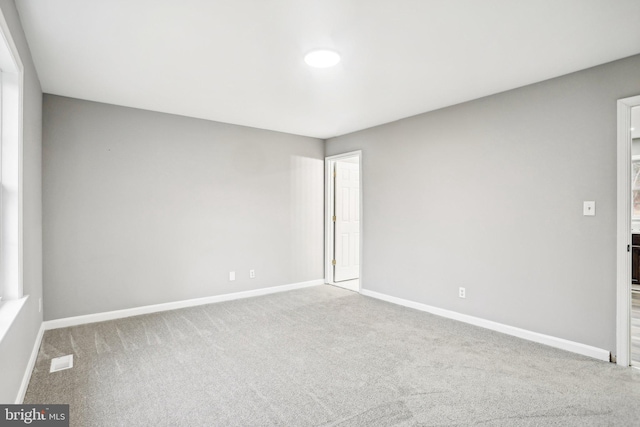 view of carpeted spare room