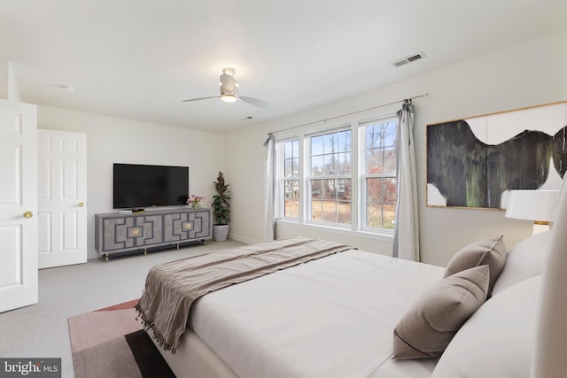 carpeted bedroom featuring ceiling fan