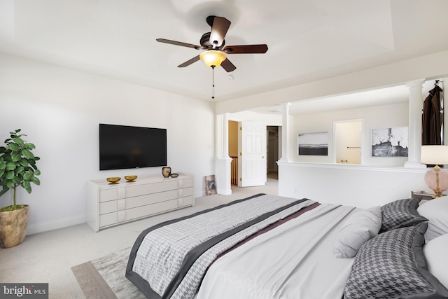 bedroom featuring ceiling fan and light carpet