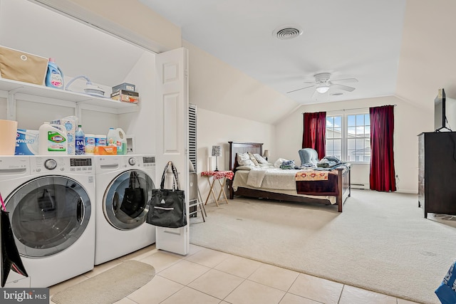 laundry area with washer and clothes dryer, light carpet, ceiling fan, and a baseboard heating unit