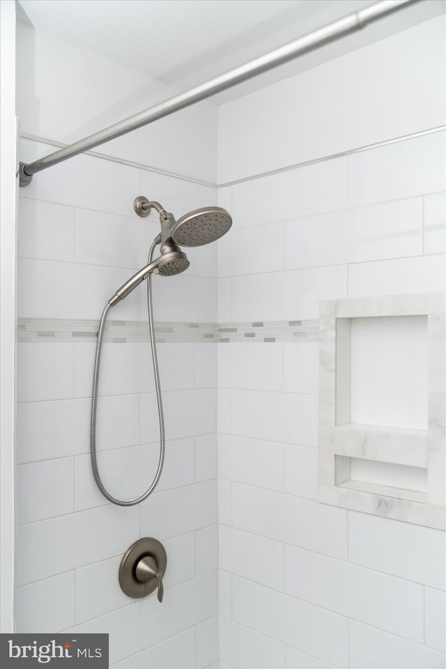 details featuring a tile shower