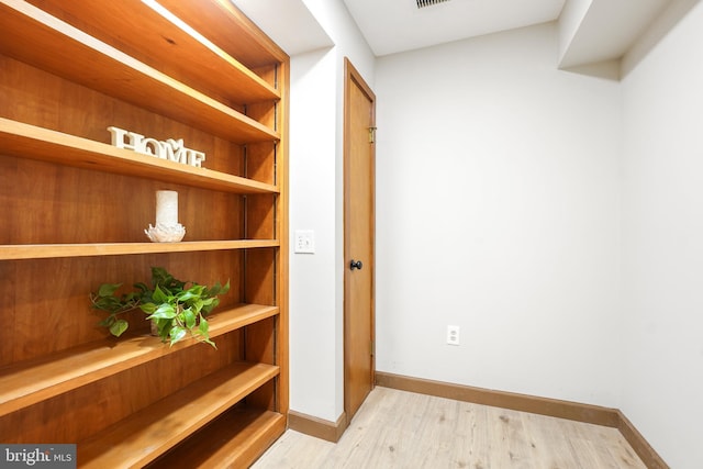 hall featuring light hardwood / wood-style flooring